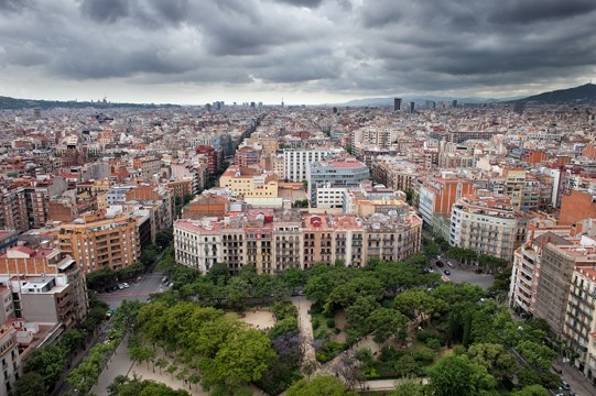 City of Barcelona in Catalonia, Spain. View from above, Placa de la Sagrada Familia on the first plan.